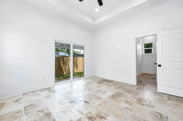 an empty room with windows