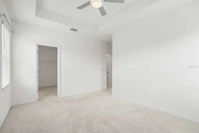 an empty room with fan