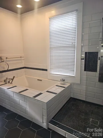 a bathroom with a sink and a bathtub