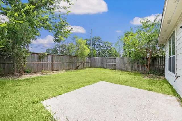 a view of a backyard with a garden