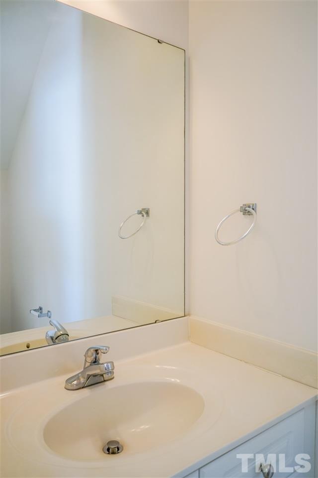 4232 Beacon Crest Way Raleigh, NC 27604 - Photo 14 of 25 a bathroom with a tub