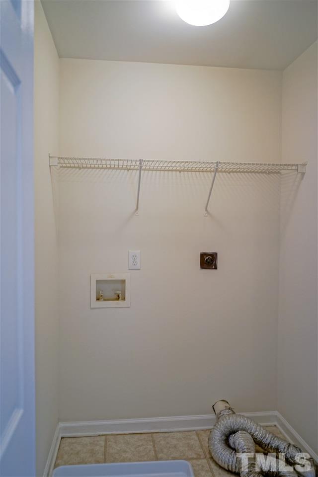 4232 Beacon Crest Way Raleigh, NC 27604 - Photo 21 of 25 a view of small space with racks on the wall