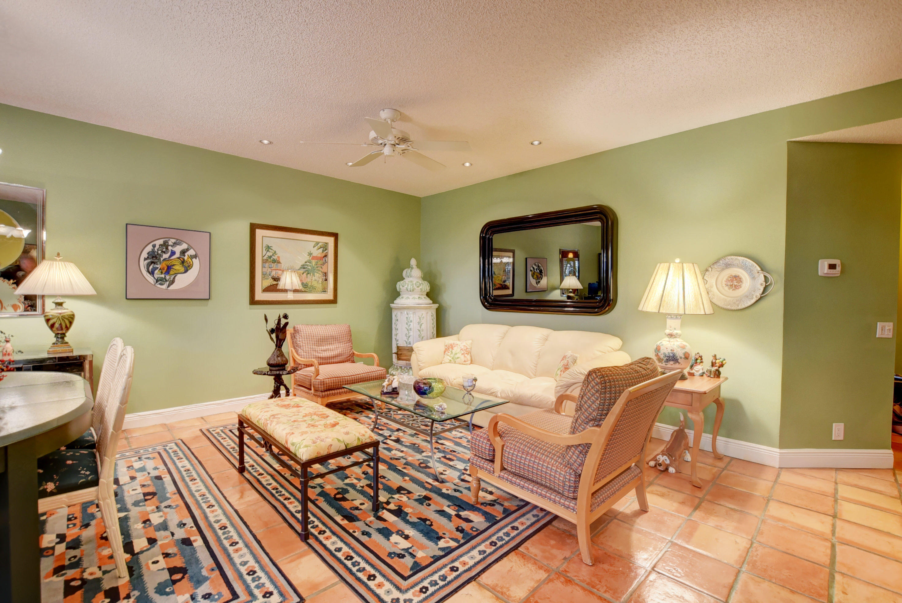 6660 Via Regina Boca Raton, FL 33433 - Photo 6 of 28 a living room with a couch and dresser