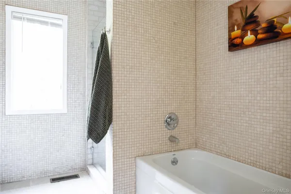 a bathroom with a bathtub
