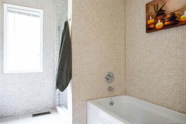 a bathroom with a bathtub