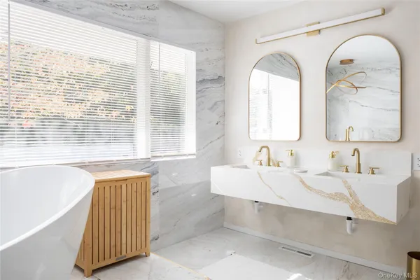 a bathroom with a sink and a bathtub