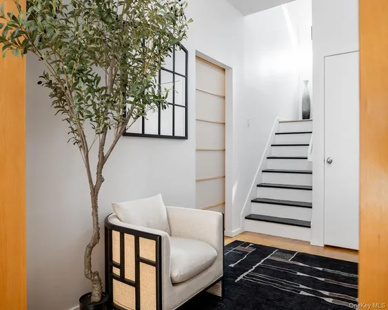 a view of entryway with stairs