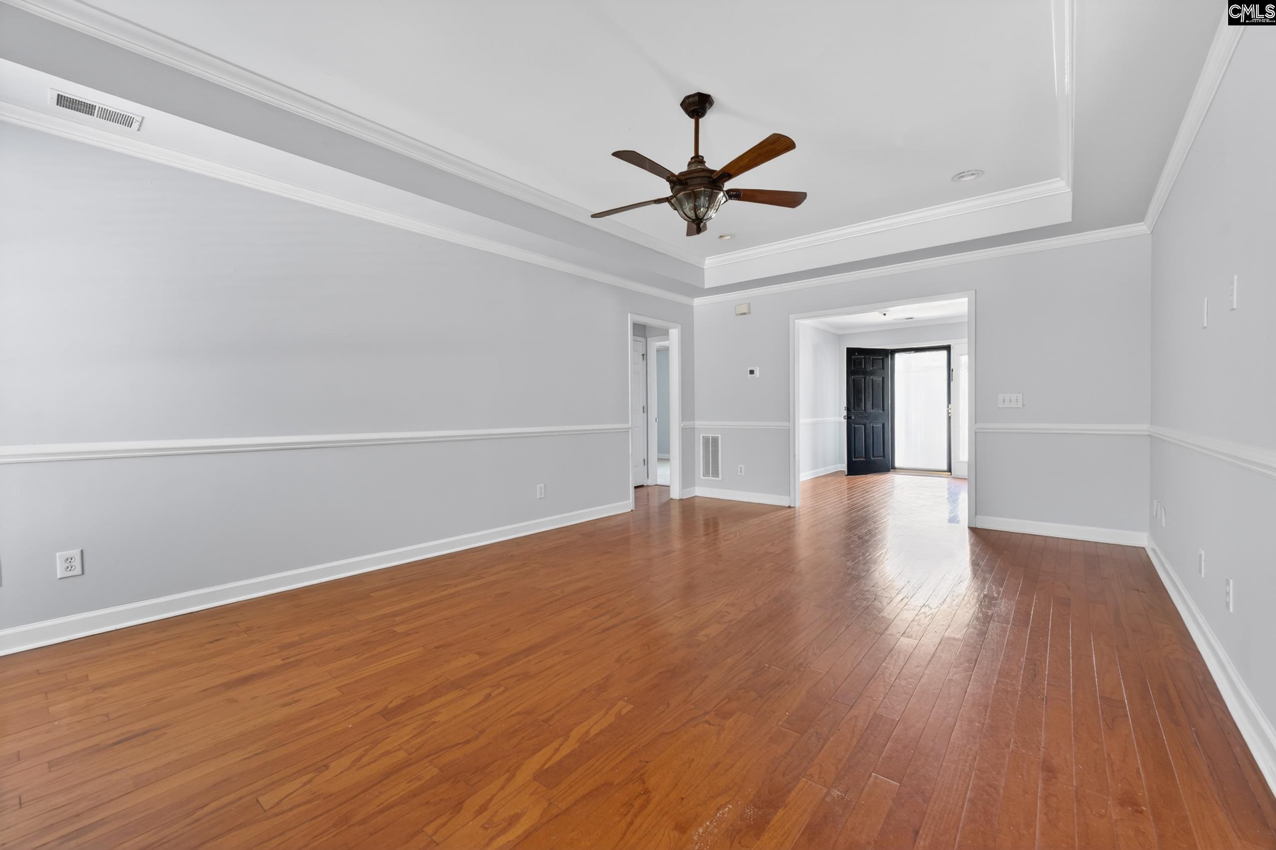 219 Plantation Pointe Drive Elgin, SC 29045 - Photo 33 of 56 a view of empty room with wooden floor and fan