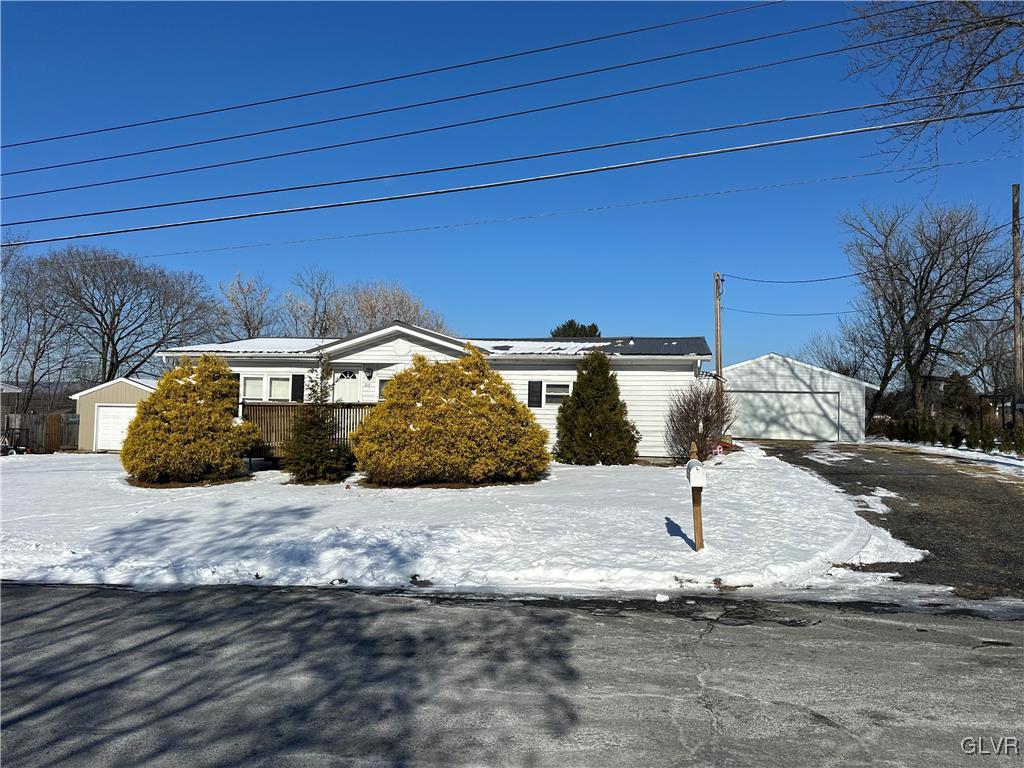 513 Norman Road Nazareth, PA 18064 - Photo 1 of 20 a view of a house with a snow in the yard