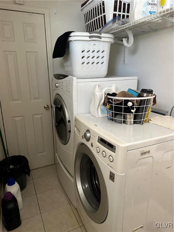 513 Norman Road Nazareth, PA 18064 - Photo 16 of 20 a view of washer and dryer with kitchen in the background