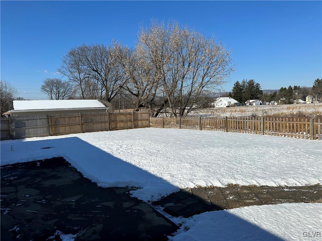 513 Norman Road Nazareth, PA 18064 - Photo 19 of 20 a view of a backyard with wooden fence