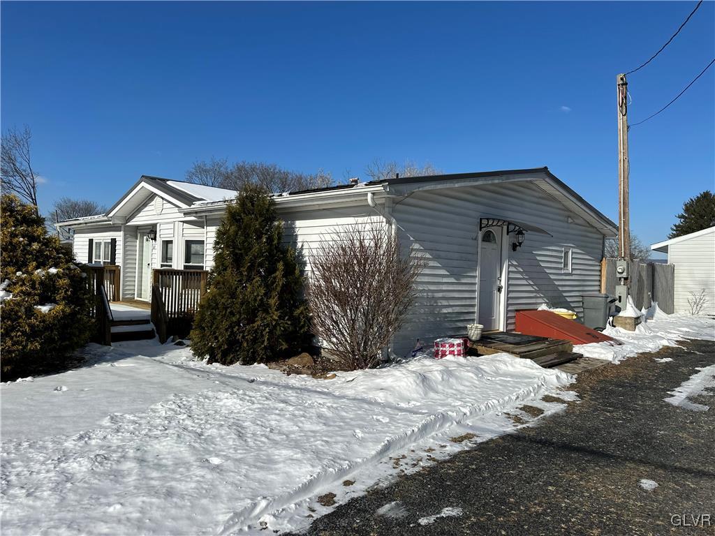 513 Norman Road Nazareth, PA 18064 - Photo 3 of 20 a front view of a house with a yard