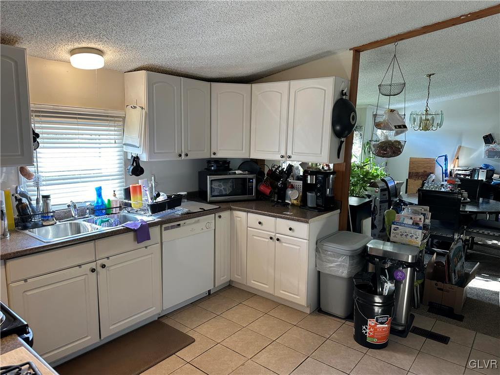 513 Norman Road Nazareth, PA 18064 - Photo 4 of 20 a kitchen with a sink cabinets and window
