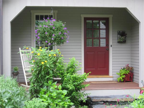 325 Leverett Road Amherst, MA 01002 - Photo 7 of 30 a potted plant sitting in front of a house