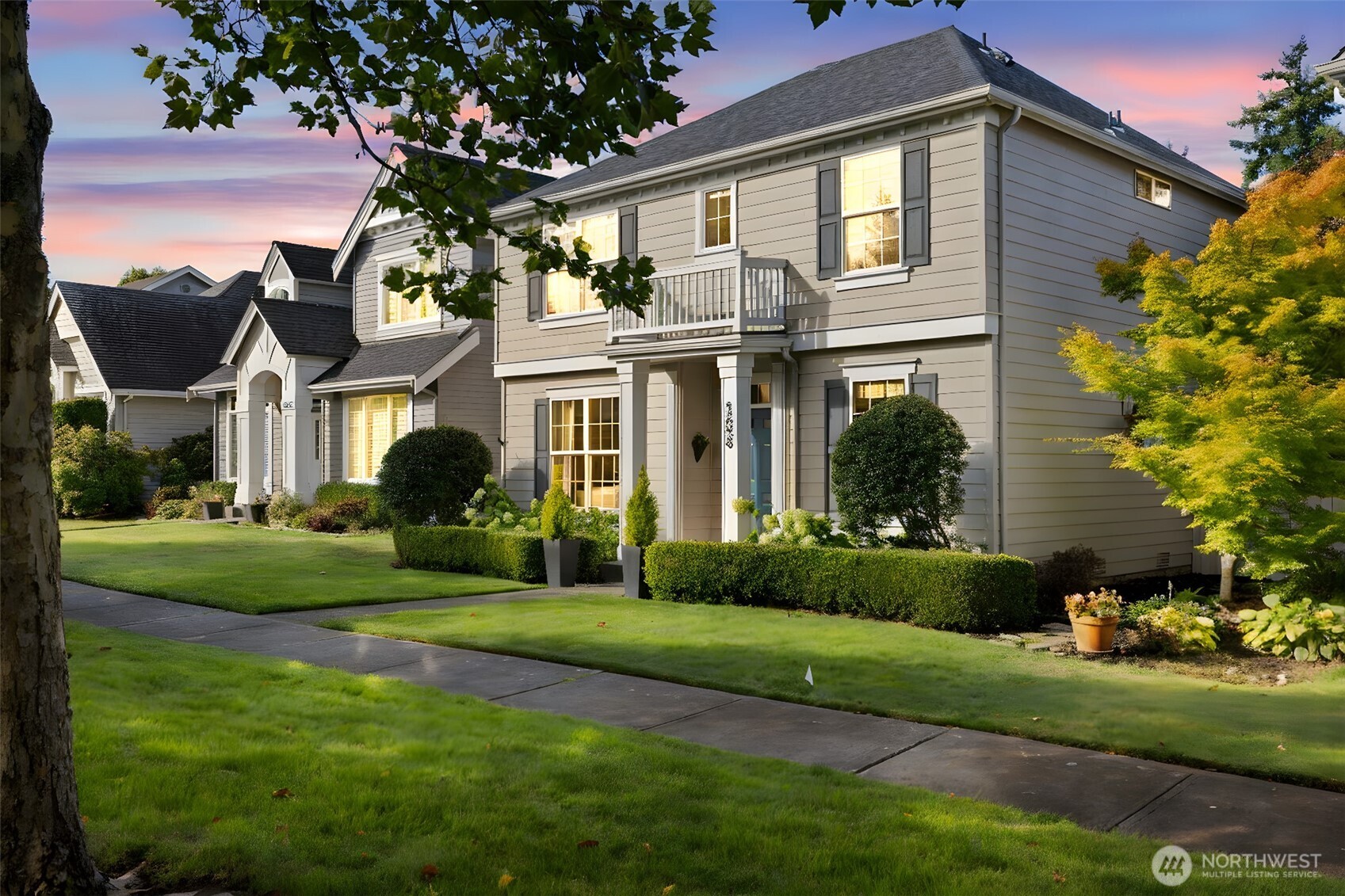 12058 Concord Way Mukilteo, WA 98275 - Photo 1 of 31 a front view of a house with a yard and potted plants