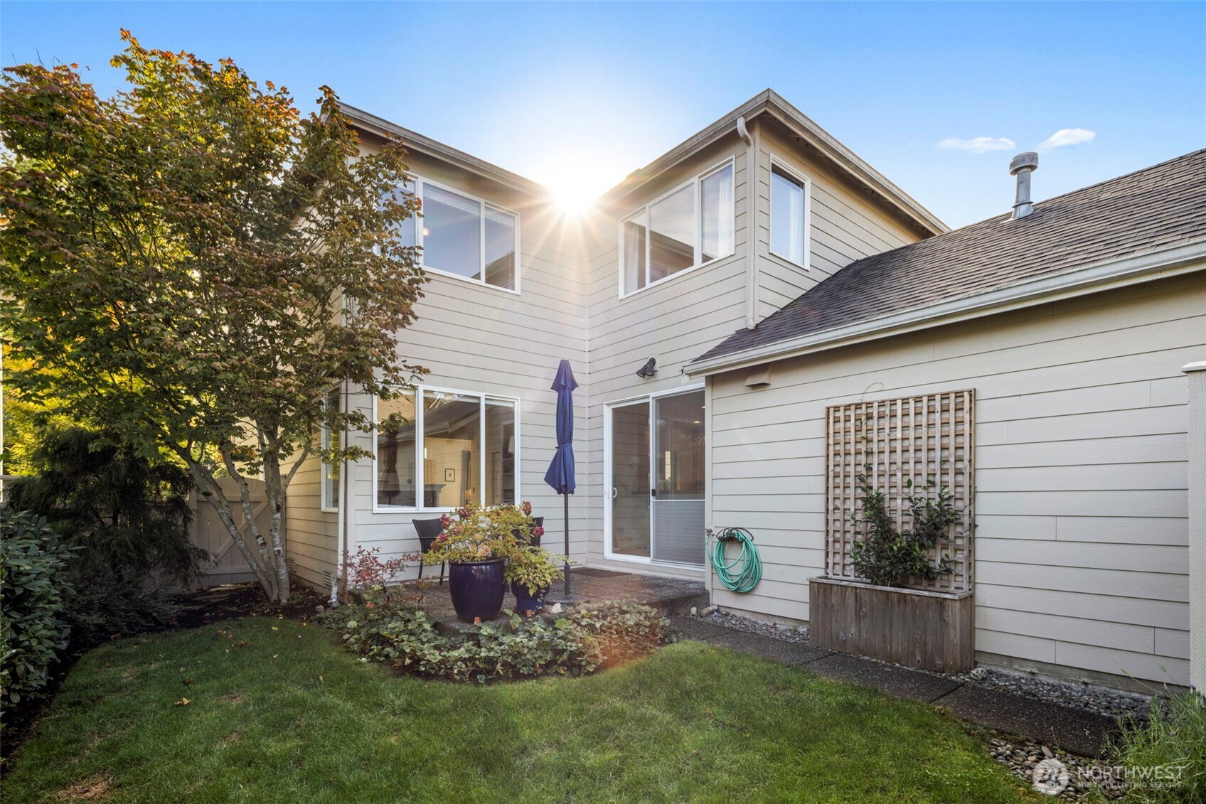 12058 Concord Way Mukilteo, WA 98275 - Photo 26 of 31 a view of a house with backyard and a tree