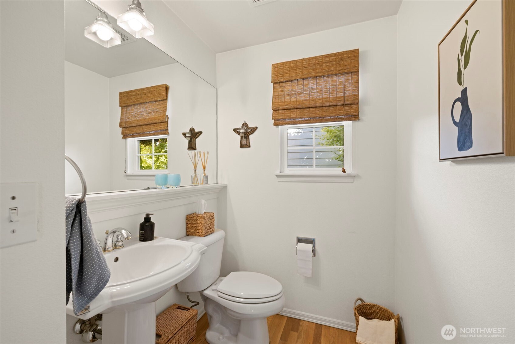 12058 Concord Way Mukilteo, WA 98275 - Photo 8 of 31 a white toilet sitting next to a bathroom sink