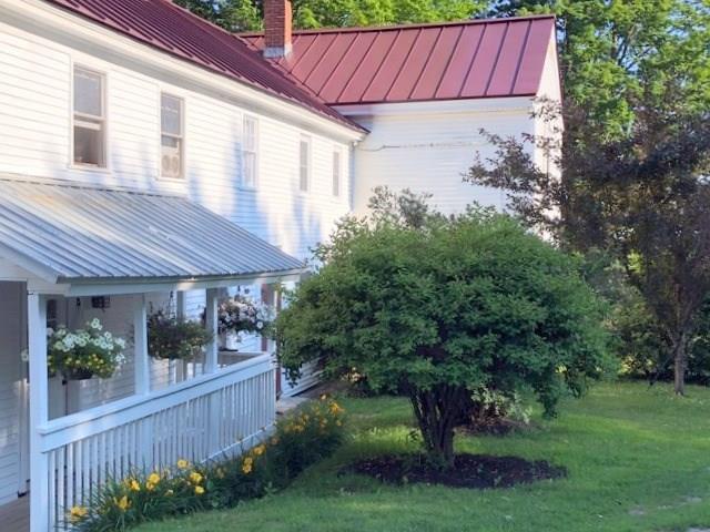 586 Pond Road Albion, ME 04910 - Photo 2 of 42 Yard and covered porch