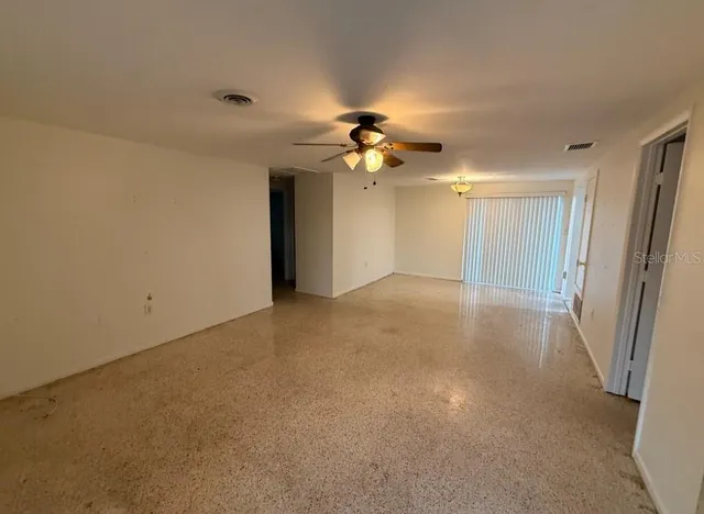 a view of a big room with carpet
