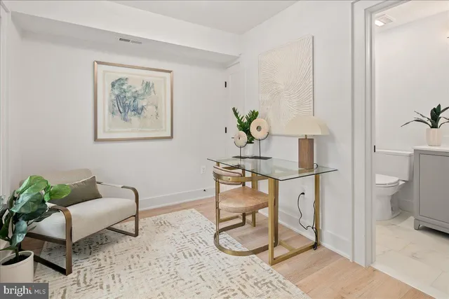 a view of entryway with wooden floor