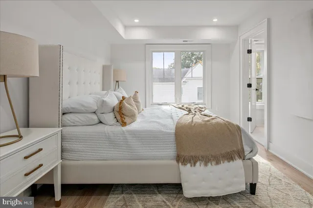 a bedroom with a bed and a cabinets