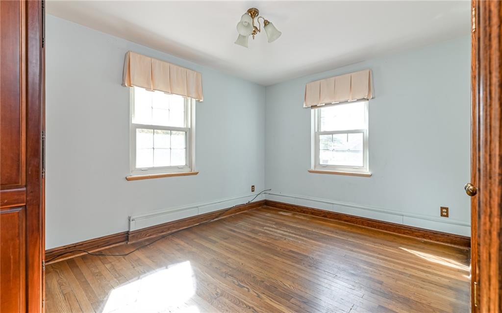 2065 Fairhill Road Sewickley, PA 15143 - Photo 11 of 45 a view of empty room with wooden floor and fan