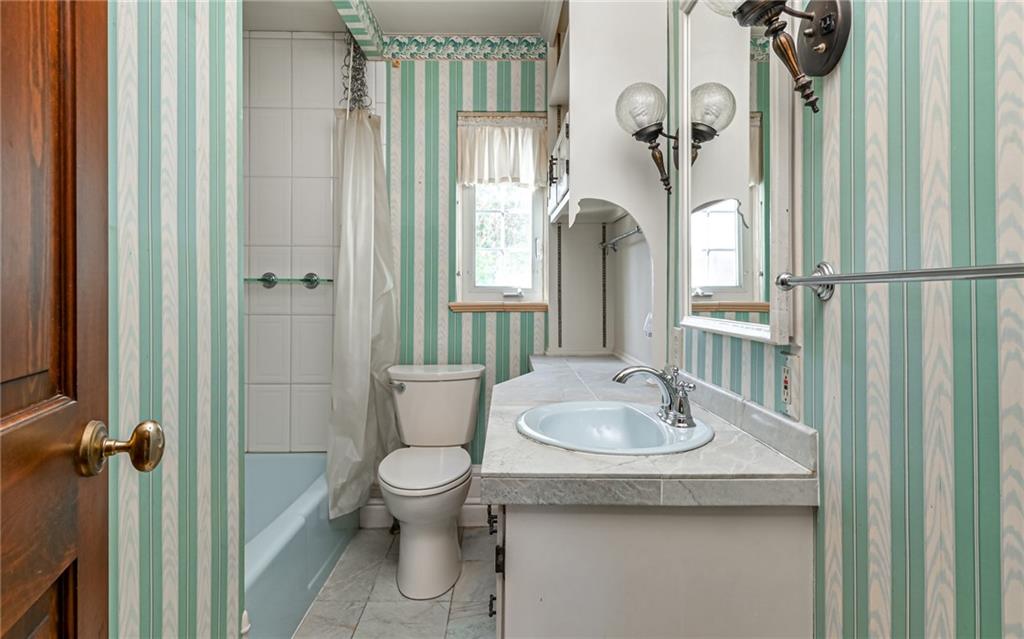 2065 Fairhill Road Sewickley, PA 15143 - Photo 12 of 45 a bathroom with a sink a toilet and shower