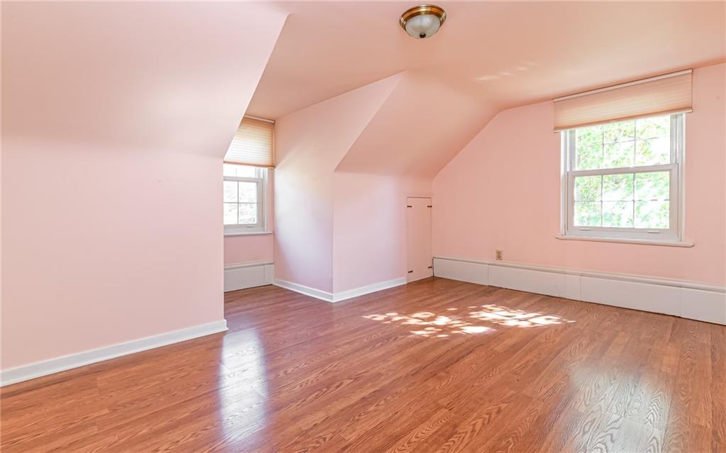 2065 Fairhill Road Sewickley, PA 15143 - Photo 14 of 45 an empty room with wooden floor and windows