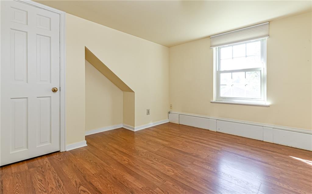 2065 Fairhill Road Sewickley, PA 15143 - Photo 15 of 45 a view of empty room with wooden floor and fan