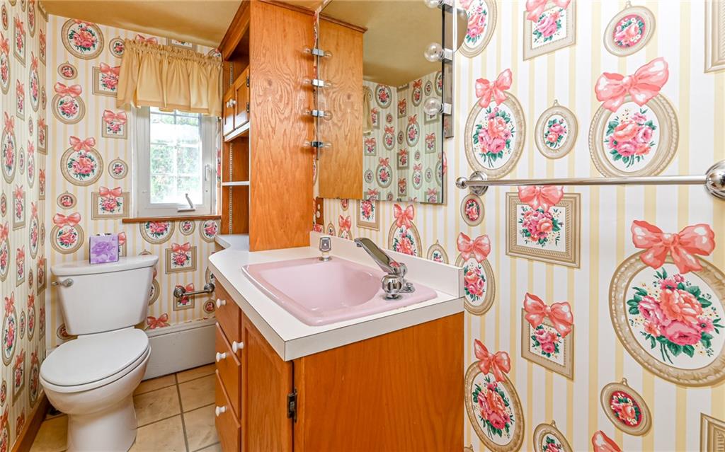 2065 Fairhill Road Sewickley, PA 15143 - Photo 17 of 45 a bathroom with a sink and toilet