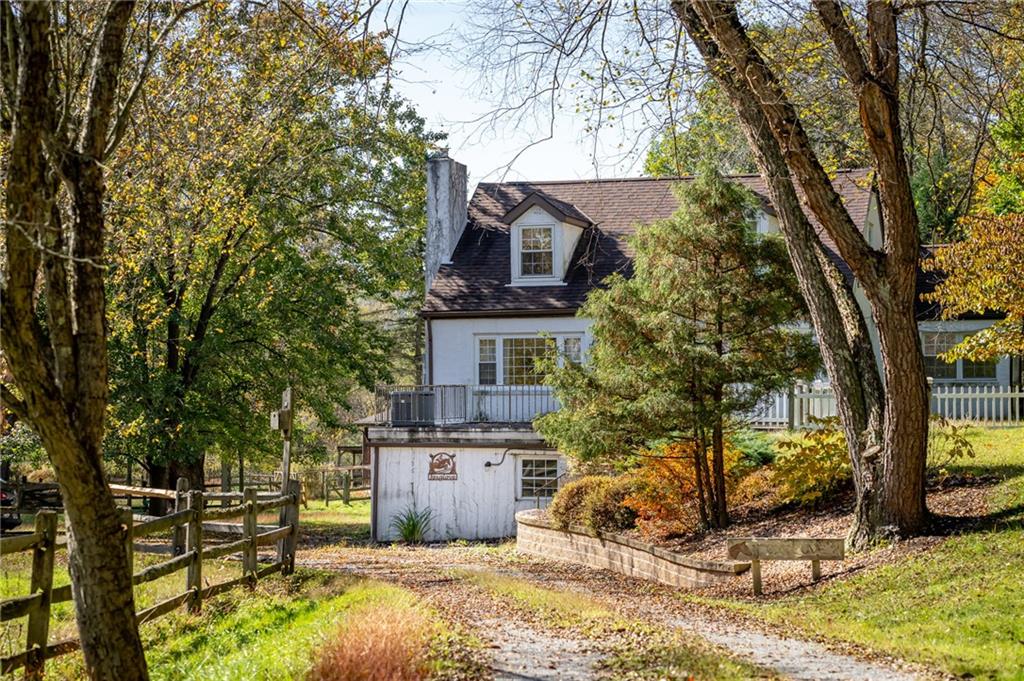 2065 Fairhill Road Sewickley, PA 15143 - Photo 3 of 45 a front view of a house with a yard