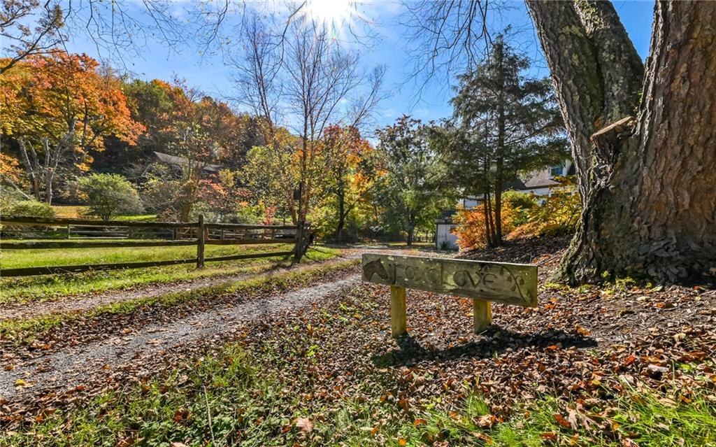 2065 Fairhill Road Sewickley, PA 15143 - Photo 41 of 45 a view of a bench in a garden
