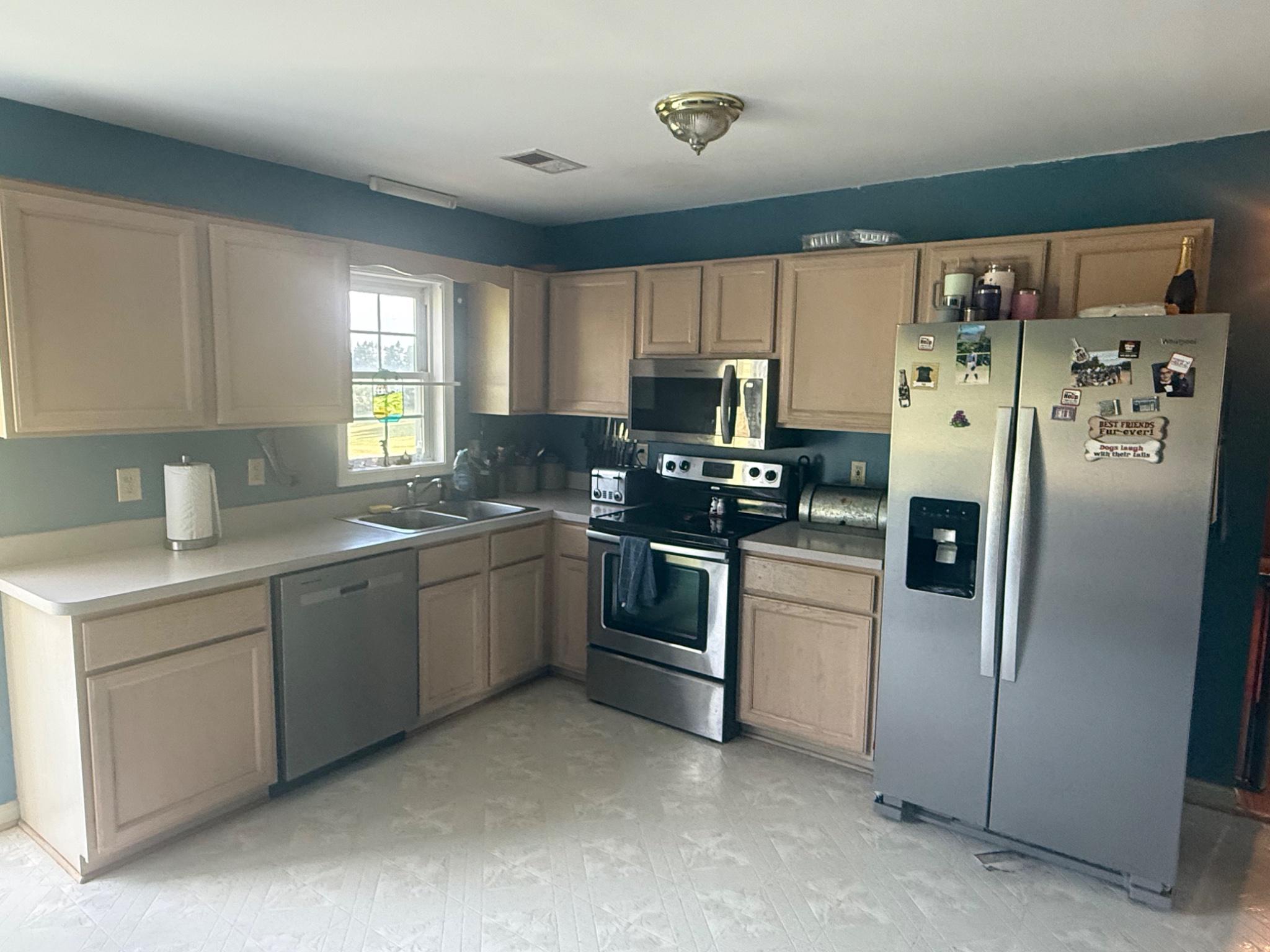 13420 Chestnut Fork Road Culpeper, VA 22701 - Photo 12 of 19 Bright kitchen space with rear deck door.