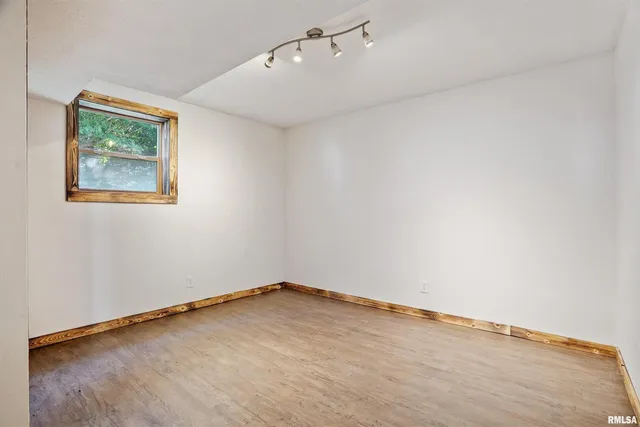 an empty room with a workbench