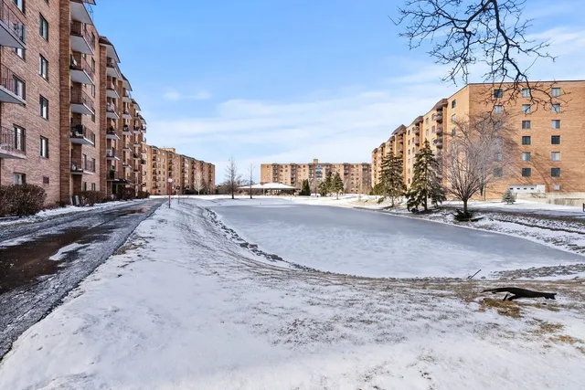 a view of a road with a building in the background