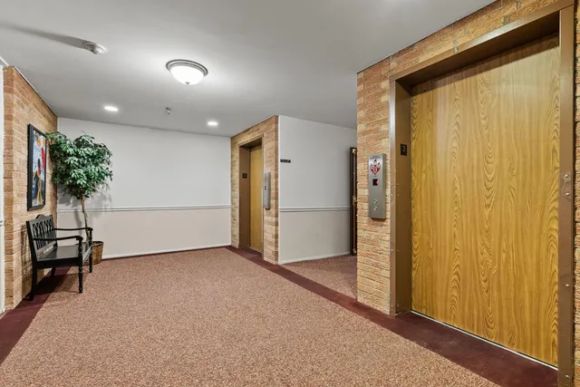a view of a livingroom with a staircase