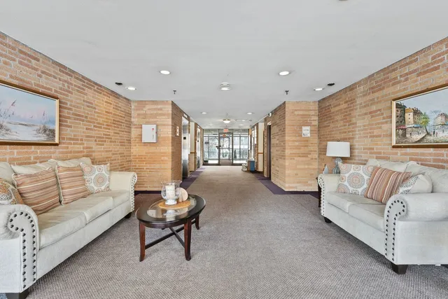 a living room with furniture and a couch