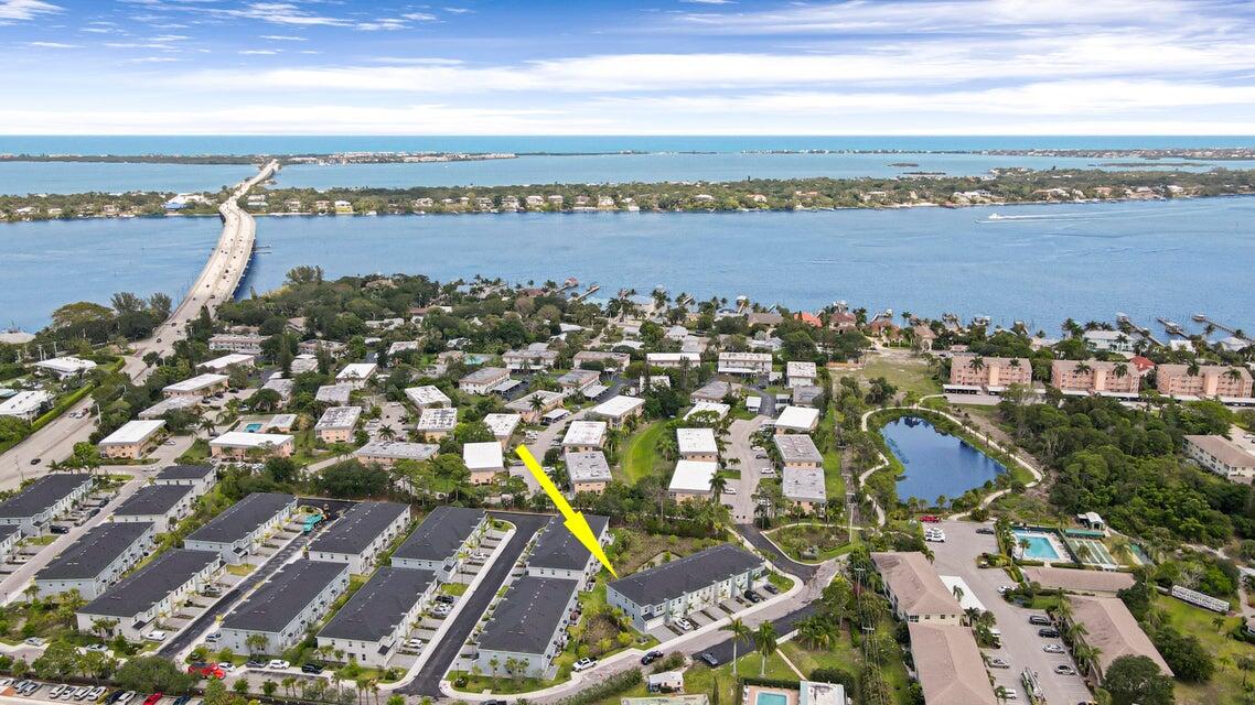 1875 Southeast Ocean Cove Way Stuart, FL 34996 - Photo 1 of 37 a view of a city and lake view