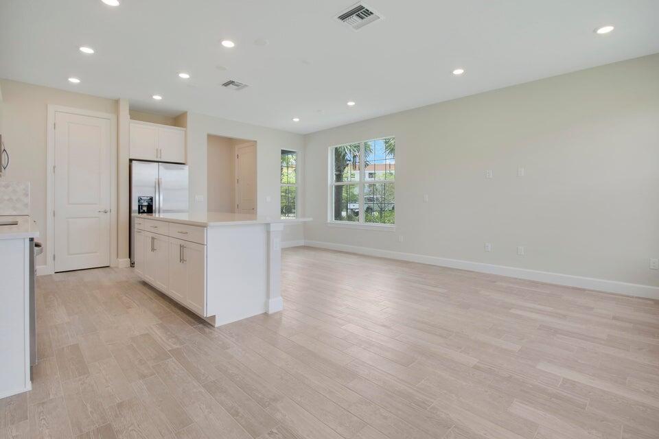 1875 Southeast Ocean Cove Way Stuart, FL 34996 - Photo 15 of 37 a view of an empty room with a window
