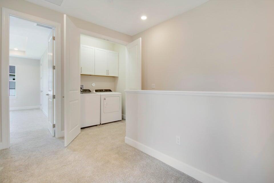 1875 Southeast Ocean Cove Way Stuart, FL 34996 - Photo 22 of 37 an empty room with a cabinet and mirrors