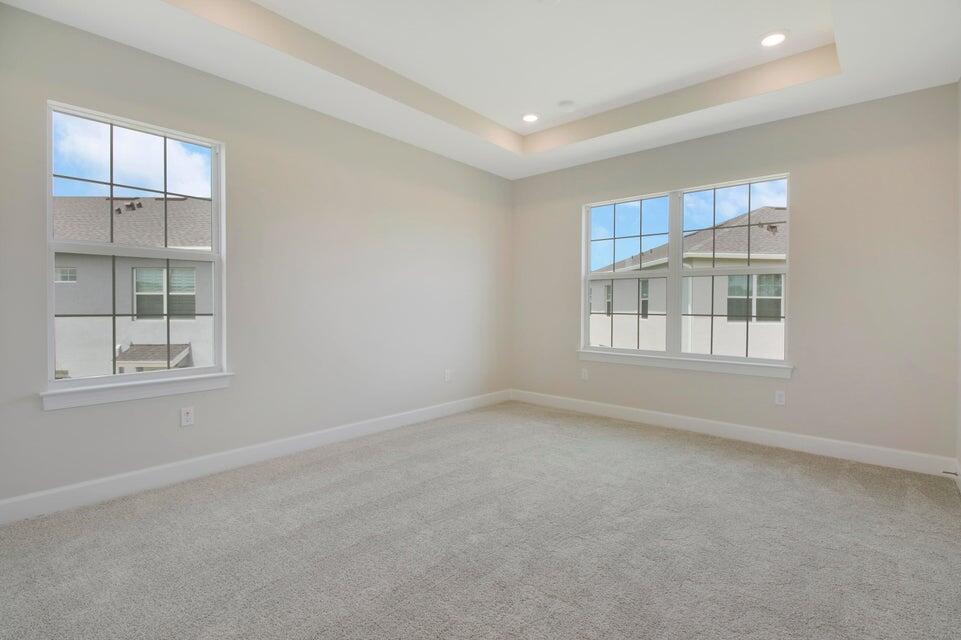 1875 Southeast Ocean Cove Way Stuart, FL 34996 - Photo 23 of 37 an empty room with windows