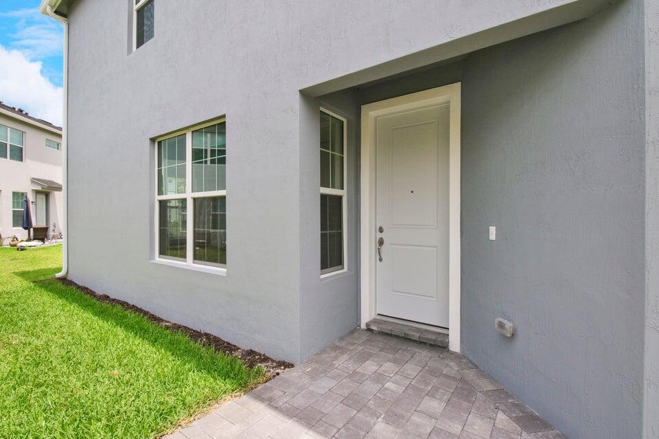 1875 Southeast Ocean Cove Way Stuart, FL 34996 - Photo 3 of 37 an empty room with windows