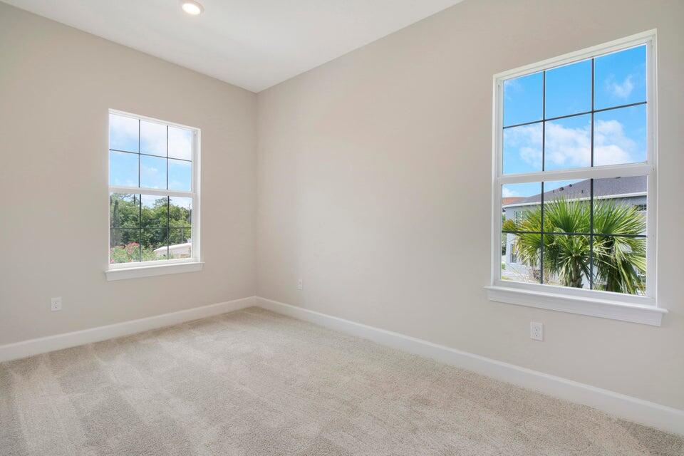 1875 Southeast Ocean Cove Way Stuart, FL 34996 - Photo 33 of 37 an empty room with windows