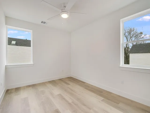 a view of a room that has a window in it