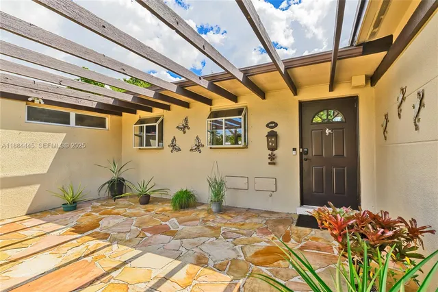 a bedroom with a bed and a table