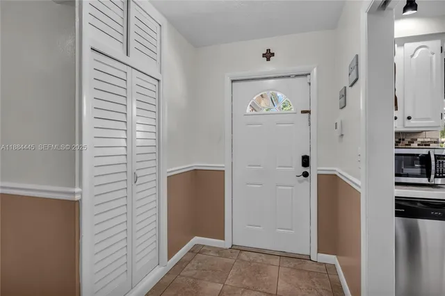 a view of a hallway with elevator