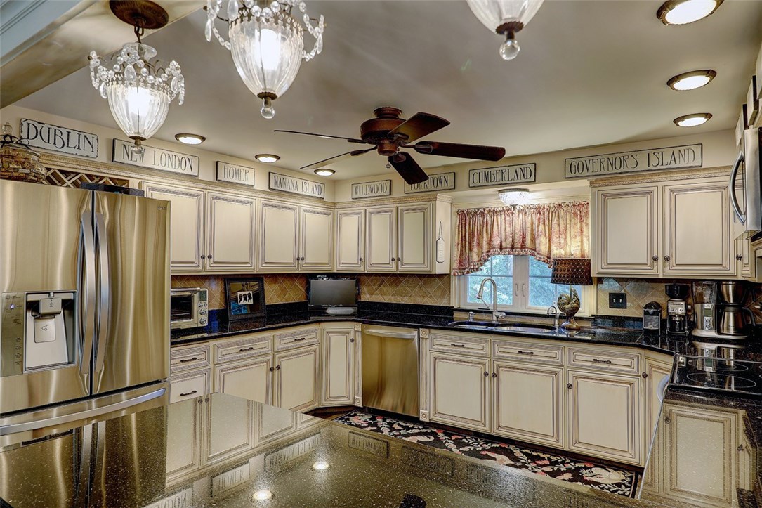 2894 Mendon Road Cumberland, RI 02864 - Photo 23 of 39 Kitchen. Stainless steel appliances. Recessed lighting.