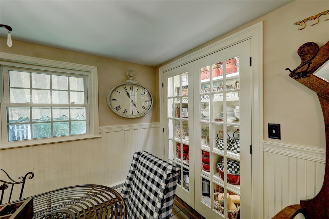 2894 Mendon Road Cumberland, RI 02864 - Photo 24 of 39 Breakfast area. Built in, lighted cabinetry. Window faces onto the back yard.