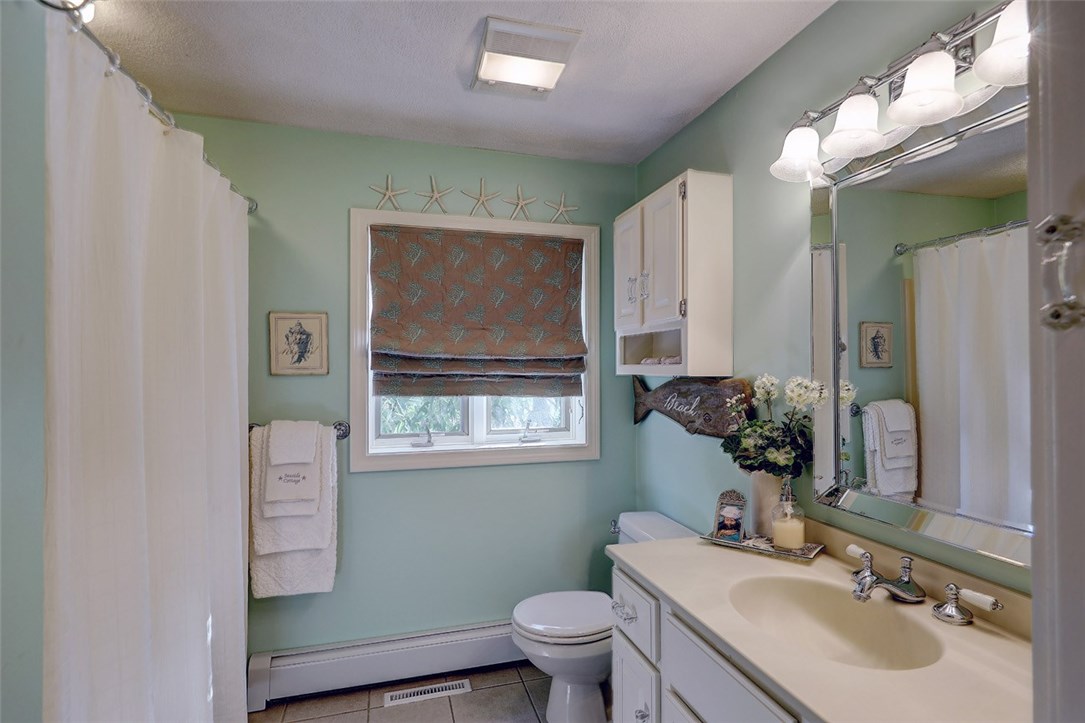 2894 Mendon Road Cumberland, RI 02864 - Photo 27 of 39 First floor full bath. Facing onto back yard.