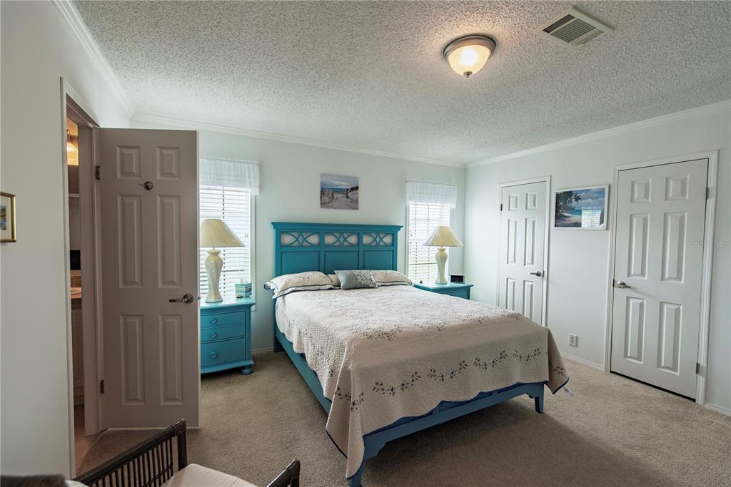 36 Freeman Avenue Punta Gorda, FL 33950 - Photo 12 of 27 a bedroom with a bed and a closet
